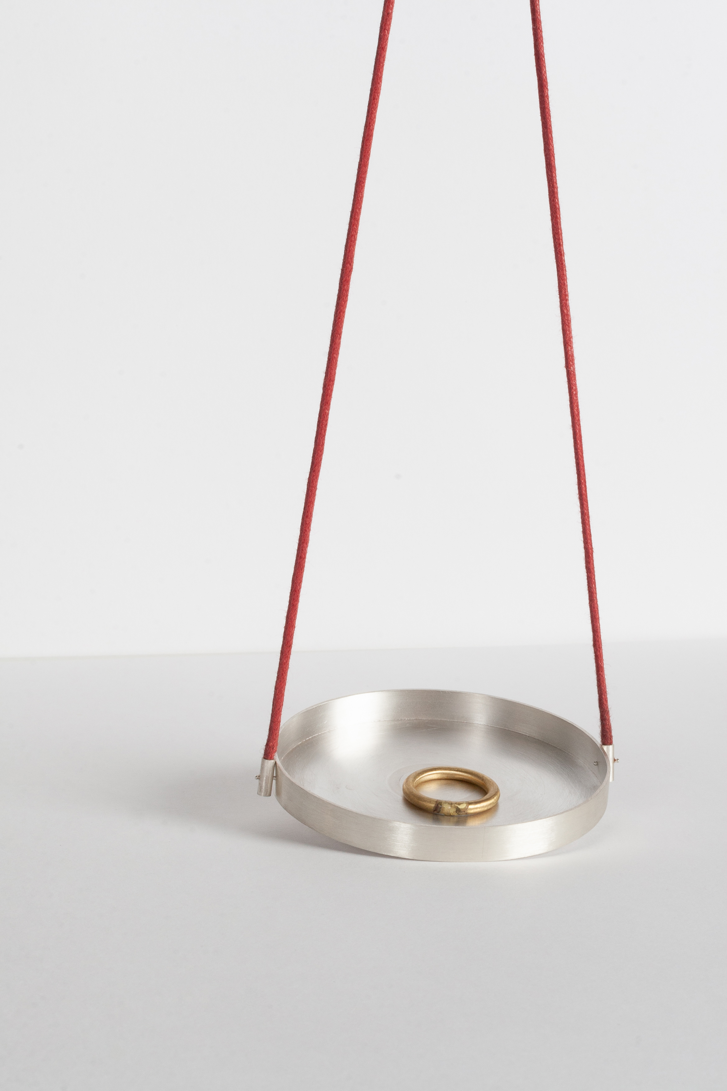 Pendant and a ring for a pocket scale